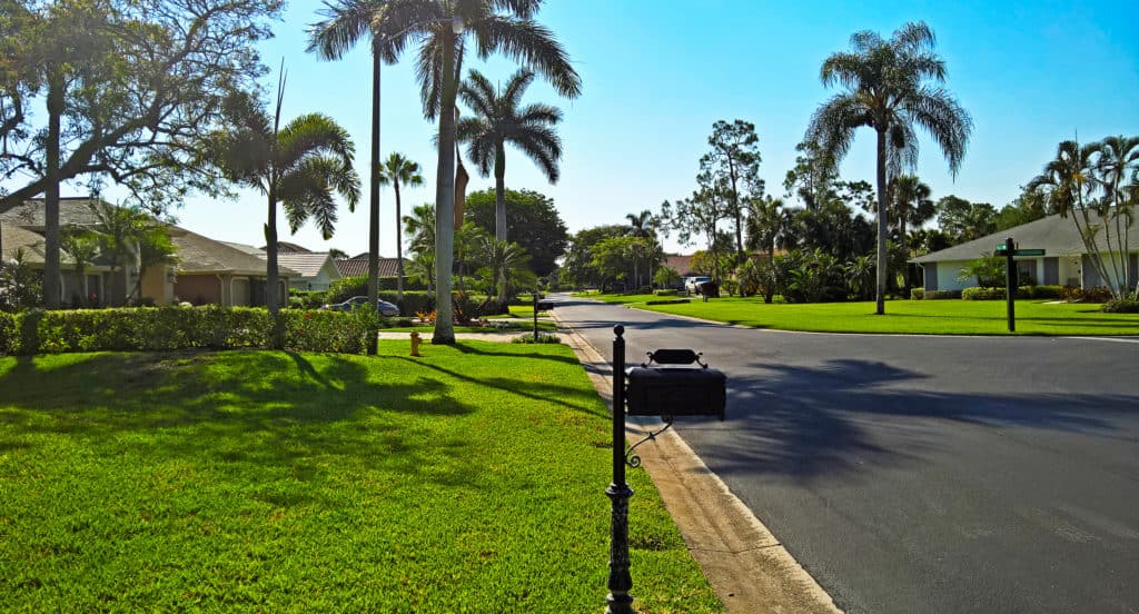 Sunny residential street in Naples Florida